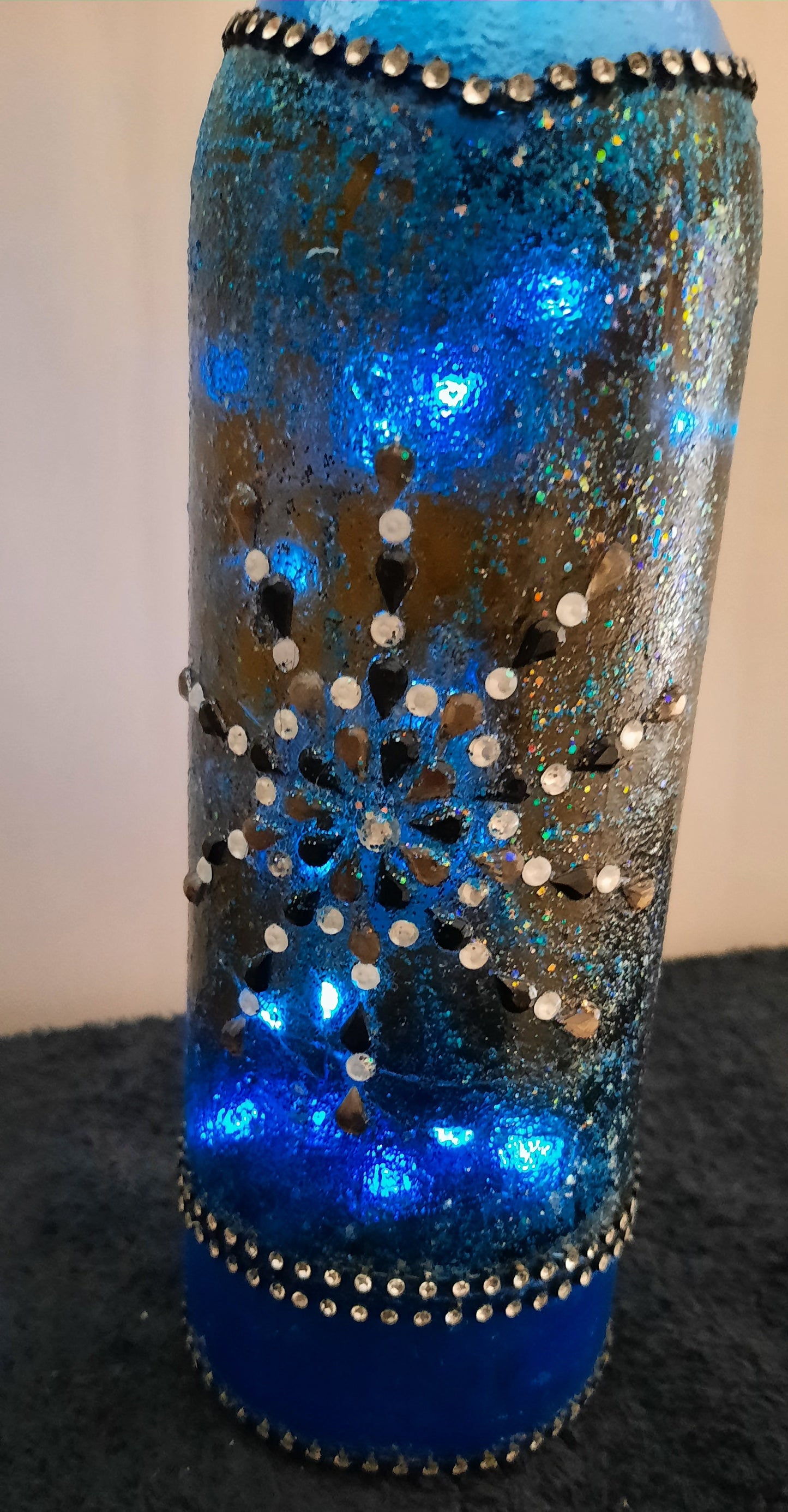 One of a kind battery operated decorative bottles
