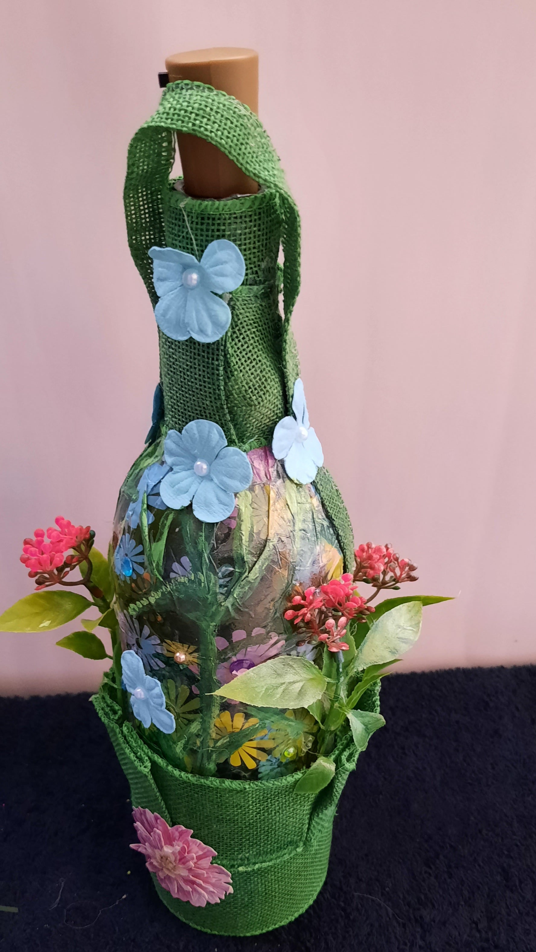This beautiful spring bottle is not just pretty to look at but it makes a beautiful nightlight which is battery operated. 