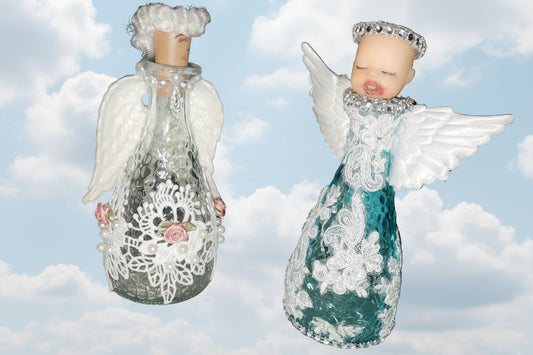 Two angel figurines with decorative clothing against a cloudy sky background